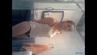 the girl undresses in the bath 