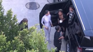 Kanye wests wife bianca censori dons shiny bodysuit for easter family outing (1080p)