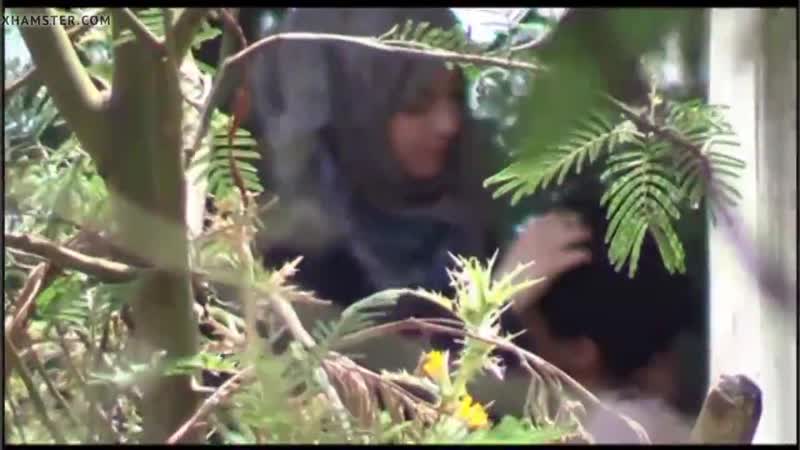 Park porn video – Indonesian muslim slut in hijab boobs pressed sucked riding cock of her boyfriend in public park amateur outdoor voyeur caught