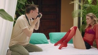 Blonde girl gets anal play from photographer