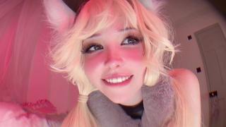 Pink haired young woman bad little kitten