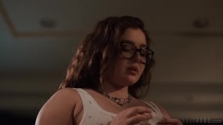 Slim brunette with long hair being held on couch